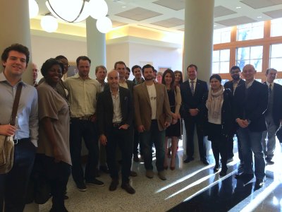 Group photograph of attendees with the speaker at the first Club event at the Homewood campus.